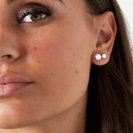 Essentials gouden stainless steel studs met helder geslepen steen